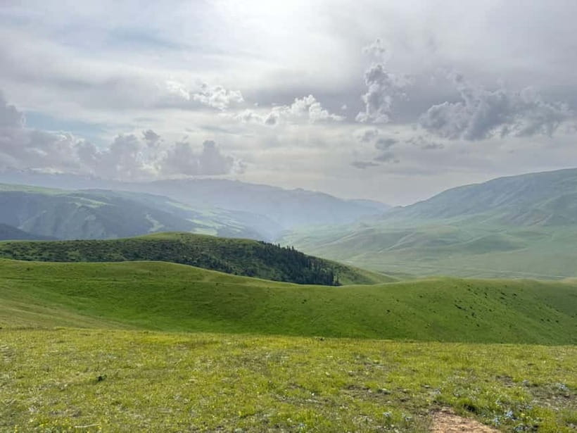 Day Trip by SUV: Turgen Waterfall & Assy Plateau Adventure - The SUV ride changes the scale of the day